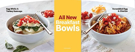 This product image provided by McDonald's advertises the restaurant chain's new breakfast bowls, including Egg White and Turkey Sausage, which contains kale, left, and Scrambled Egg and Chorizo. The world's biggest burger chain says it's testing the two breakfast bowls in Southern California. (AP Photo/McDonald's)