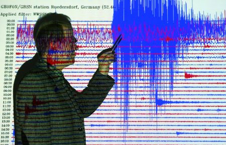 German seismologist Rainer Kind shows a graph registered during the earthquake that caused the ...
