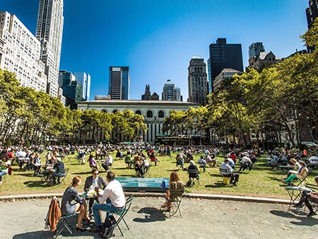 people eating lunch in bryant park