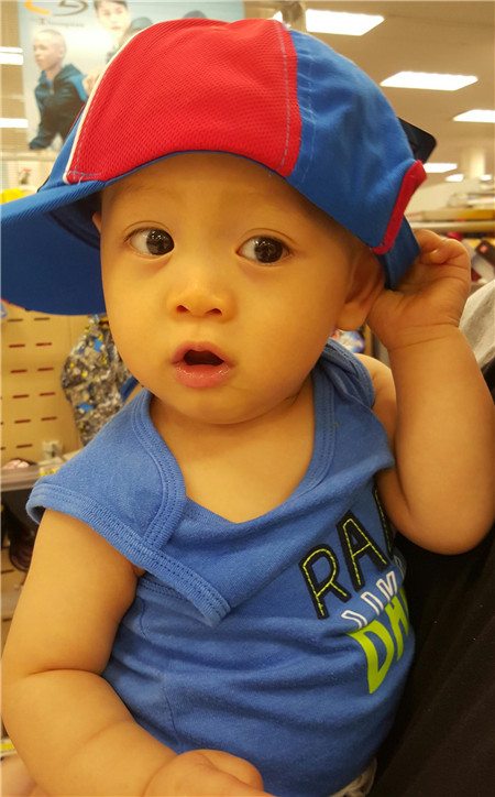 Samuel - playing with my favorite hat